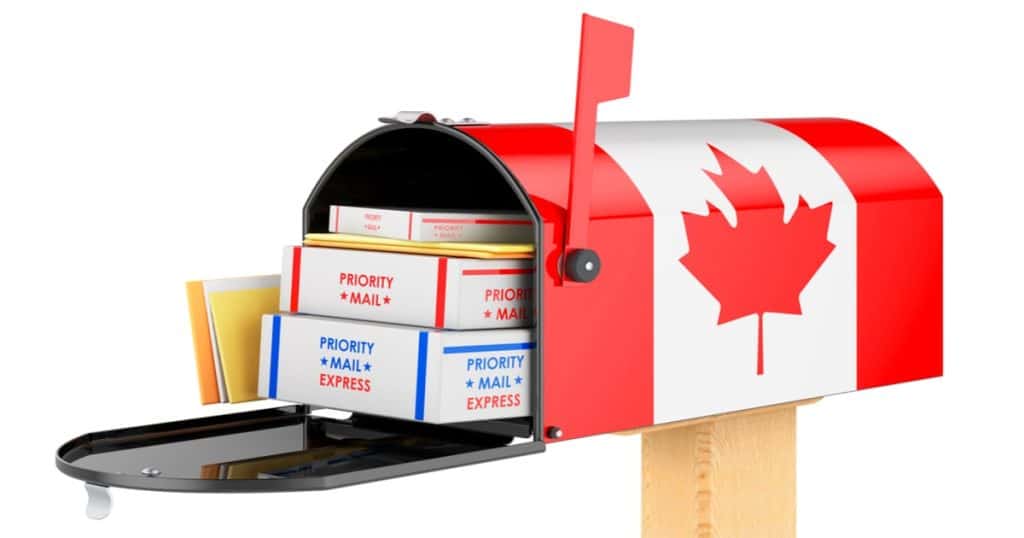 Canadian mailbox full of packages and documents