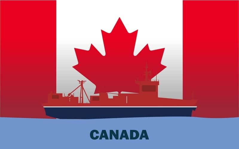 Red cargo ship sailing against a Canadian flag background