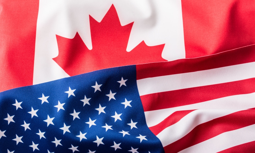 A Canadian flag and an American flag