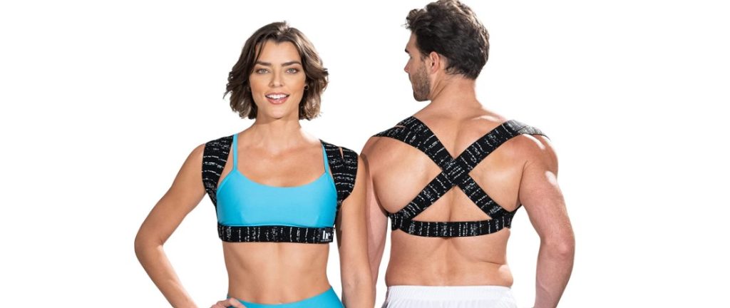 A female and male model wearing the BackEmbrace Posture Corrector.