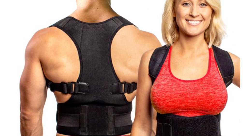 A man and a woman wearing FlexGuard’s Posture Corrector.