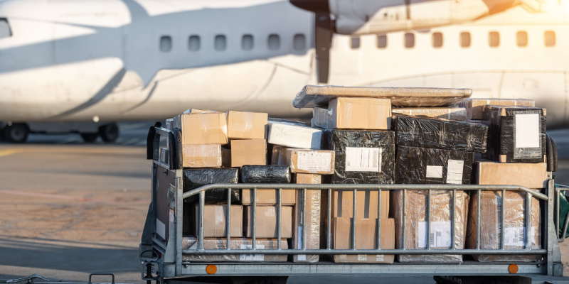 USA to Canada shipping packages on a cart