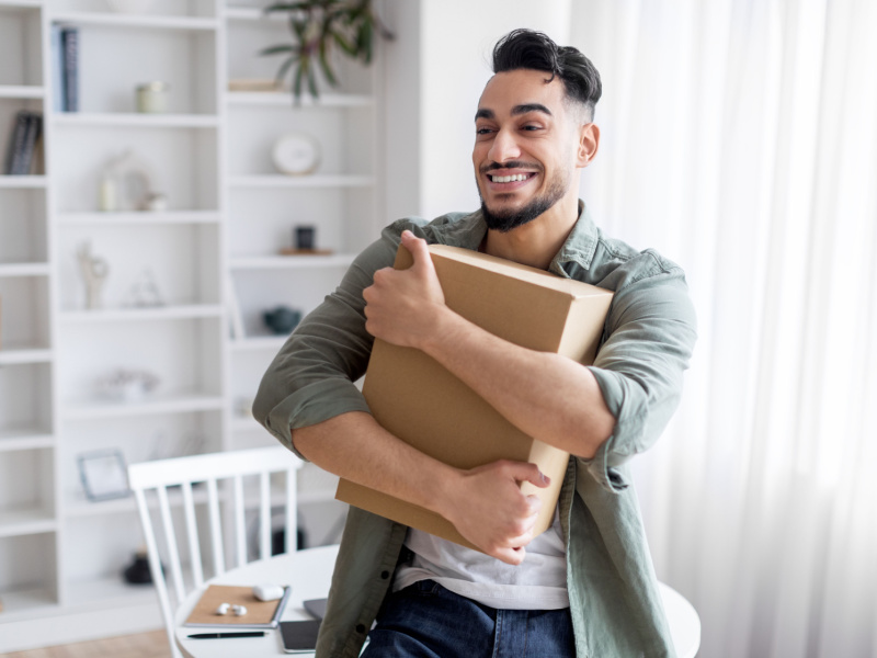 A man using parcel pickup service