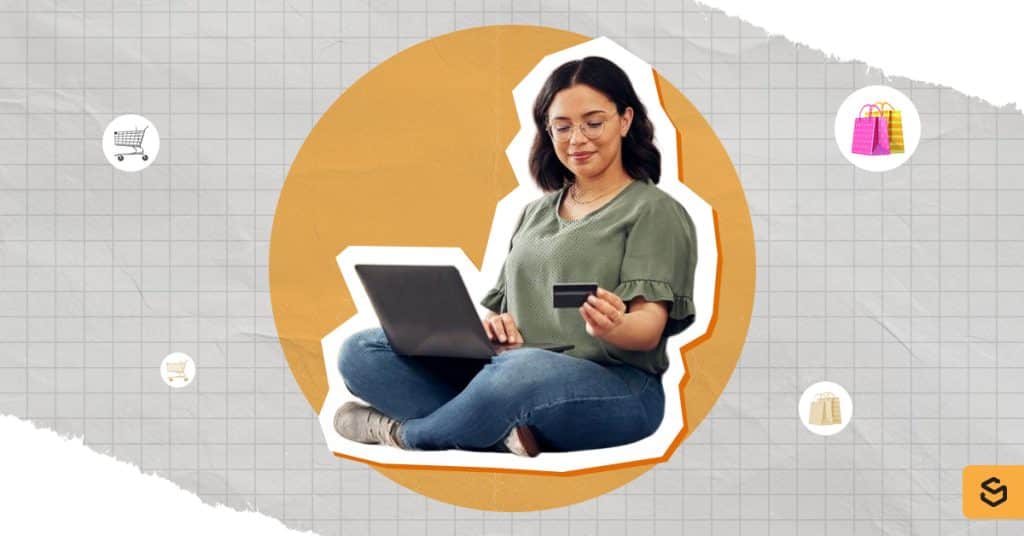 A woman with a laptop and credit card