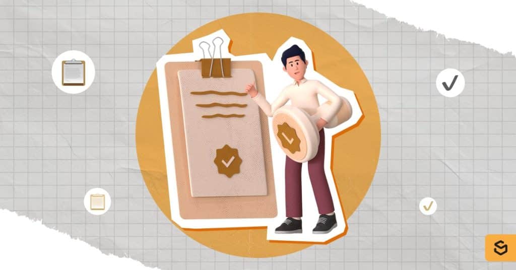 A man holding a big stamp while looking at the big clipboard