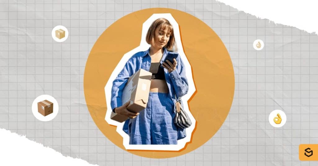 A woman holding a package while looking at her phone