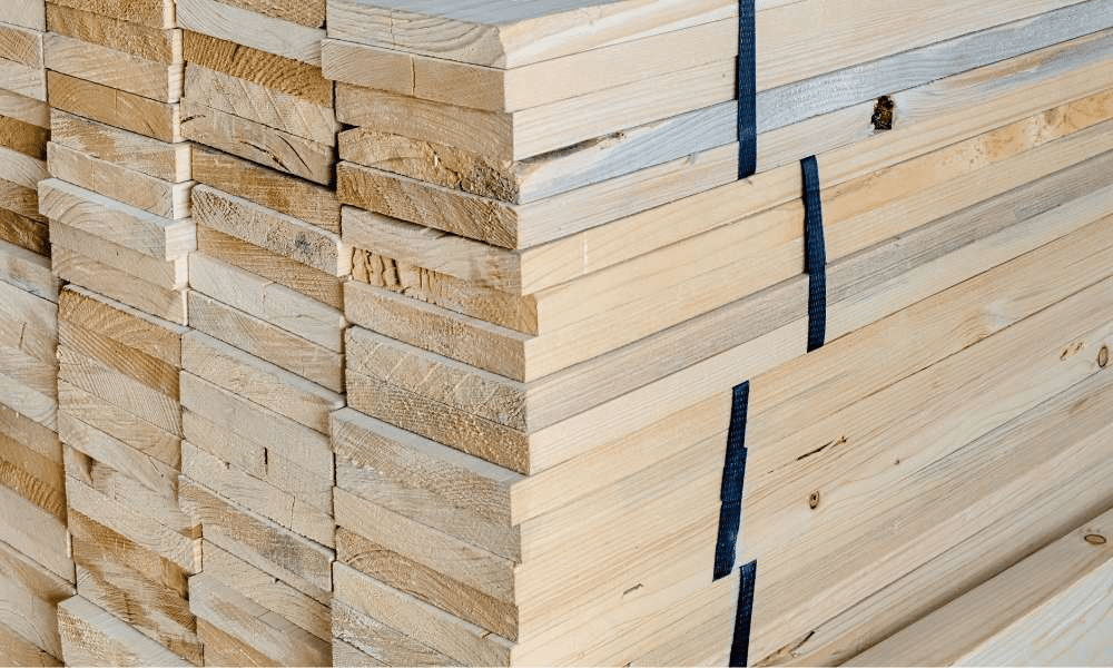 Stacks of cut lumber bound.